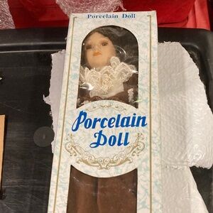 Porcelain Doll with Brown Dress